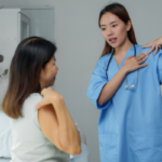 Patient wearing sling after Shoulder Replacement Surgery Bangalore with Dr. Vijaykumar D