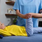 Best Paediatric Orthopaedic Doctor in Bangalore examining a child's leg alignment